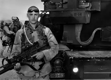 Soldier reflecting outdoors